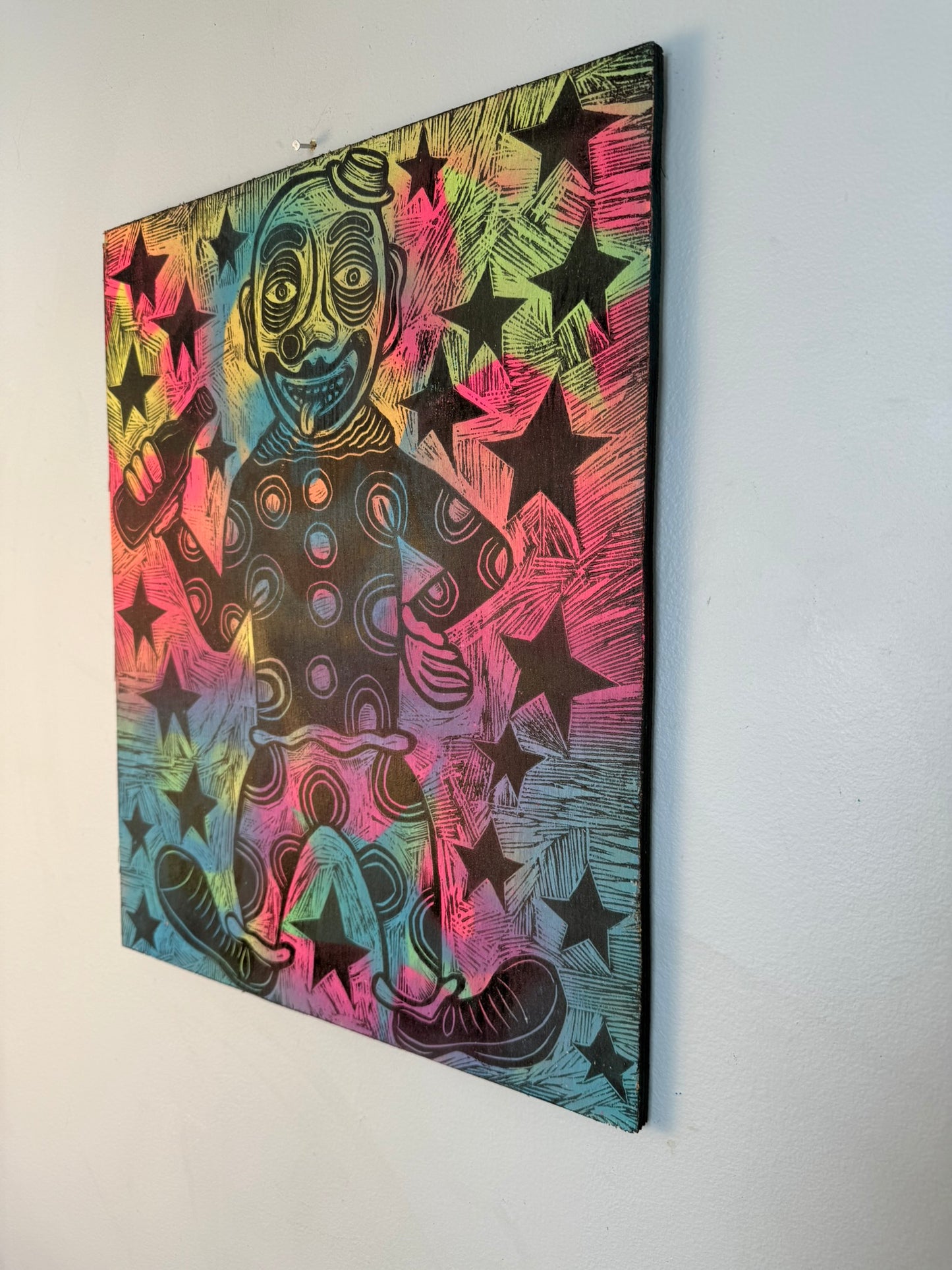 Cosmic Clown Woodcut printed on a Wooden Panel