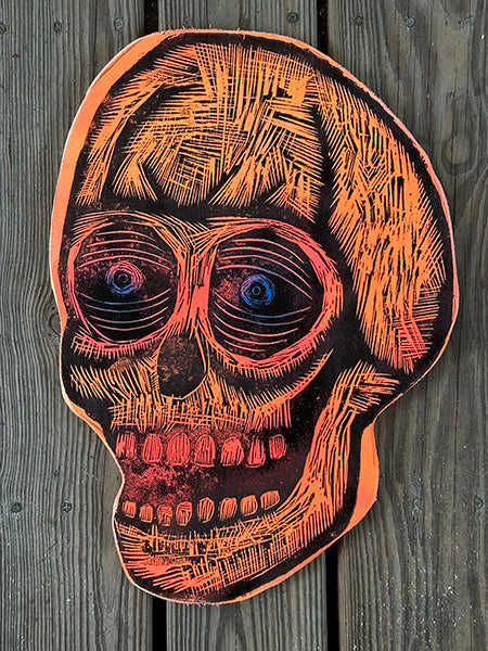 Orange Skull With Blue Eyes Woodcut Printed on Wooden Panel