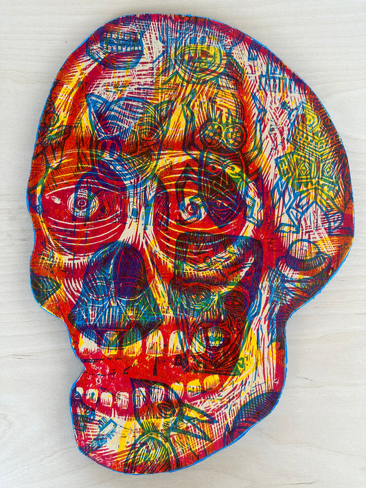 Yellow Blue and Red Skull Woodcut Printed on Wooden Panel